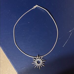 Elegant Silver Sunburst Pendant Necklace